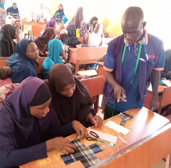 8. participants cutting reusable pads